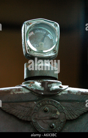 Glass thermostat temperature gauge on vintage car Stock Photo