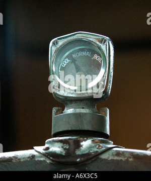 Glass thermostat temperature gauge on vintage car Stock Photo