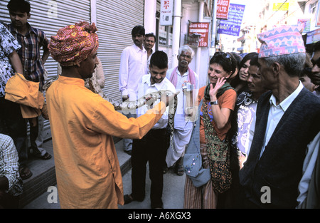 Serpent charmer from India featuring snake showoff in Thamel Kathmandu Nepal Stock Photo