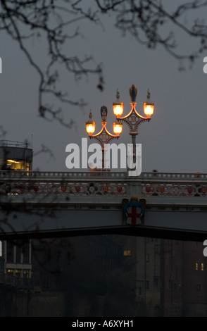 Lendal Bridge at dusk with antique streetlights on bridge lit Stock Photo