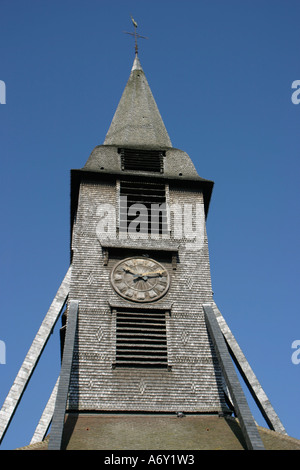 Exterior clock at Eglise Ste Catherine a wooden church in Honfleur, Normandy, France Stock Photo