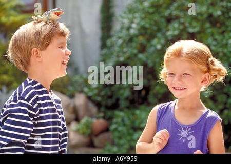 portrait of a boy and a girl fooling around