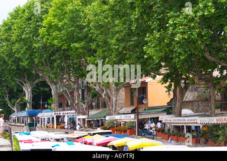 The street market and a row of cafes and restaurants under the plane trees. Collioure. Roussillon. France. Europe. Stock Photo