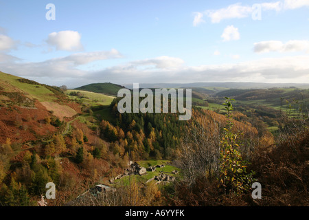 Looking down on the remains of 19th-century Bryntail Lead Mine below the dam of Clywedog reservoir, Powys Mid Wales, UK Stock Photo