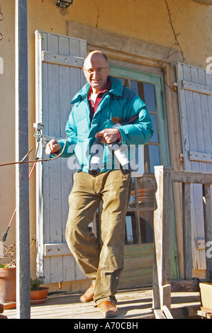 Bernard Bellahsen. Domaine Fontedicto, Caux. Pezenas region. Languedoc. Owner winemaker. France. Europe. Bottle. Stock Photo