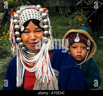 Mother Baby Market Bridge Akha women Thailand smile smiling Stock Photo