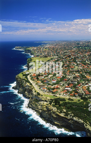 Aerial of Sea Cliffs and Macquarie Lighthouse Oldest Lighthouse in Australia at Watsons Bay in Sydney New South Wales Australia Stock Photo