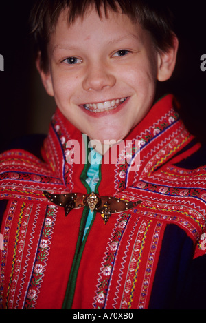 Europe, North Europe, Scandinavia, Finland, Lapland, Lemmenjoki,Young Sami in traditional costume. Stock Photo