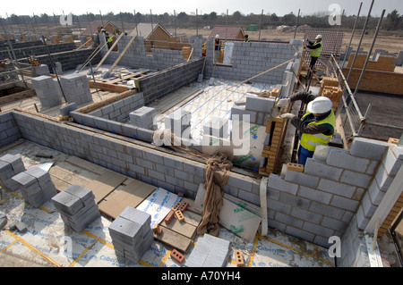 Bricklayers at work on a housing development Stock Photo