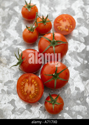 Mixed tomatoes on metal worktop - high end Hasselblad 61mb digital image Stock Photo