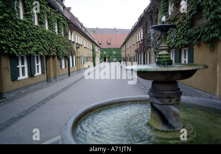 geography / travel, Germany, Bavaria, Augsburg, Fuggerei, founded 1516 by Jakob Fugger, way with fountain , Stock Photo