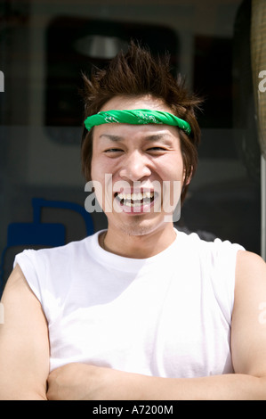 Portrait of young man smiling Stock Photo