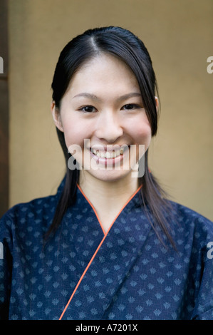 Portrait of young woman smiling Stock Photo