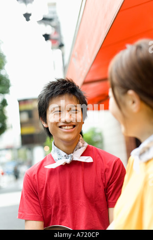 Waiters standing in front of coffee shop Stock Photo