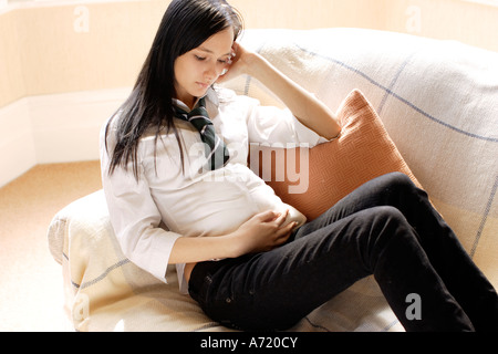 Pregnant school girl Stock Photo