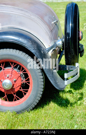 Stock image the back of a vintage Ford Model A automobile from the 1930s that has a spare tire on the back Stock Photo
