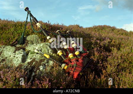 Bagpipes and Mar Lodge Esate, a scottish glen in Braemar Cairngorm National Park Scotland uk Stock Photo