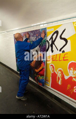 Man sticking up in a Paris metro tunnel Stock Photo