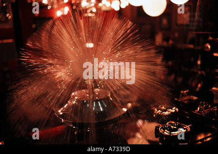 Fibre optic lamp in a shop window display 1970s Stock Photo