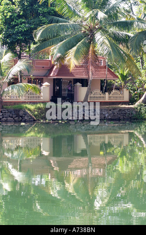 Modern housing on the banks of the Kerala Backwaters,the area which is also known as the Venice of the East Stock Photo