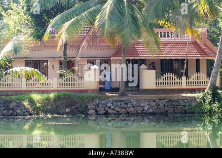 Modern housing on the banks of the Kerala Backwaters,India,Also known as the Venice of the East Stock Photo