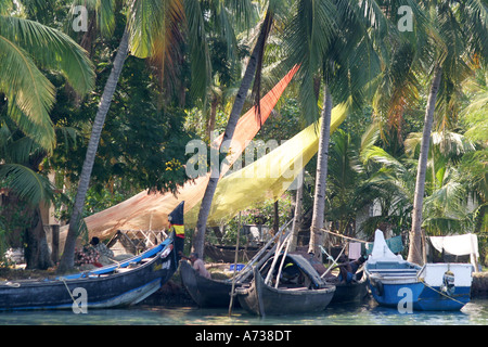 Drying colourful Fishing Nets on the banks of the Kerala Backwaters Stock Photo