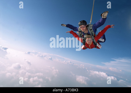 two sky divers in tandem jump, Germany, Brandenburg, Fehrbellin Stock Photo