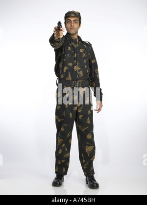 Indian soldier aiming gun Stock Photo - Alamy