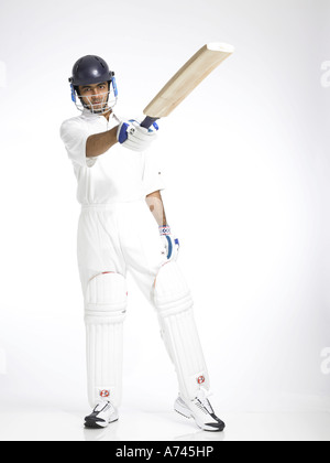 VDA 201775 Indian batsman raising bat for good score in cricket match MR 702A Stock Photo