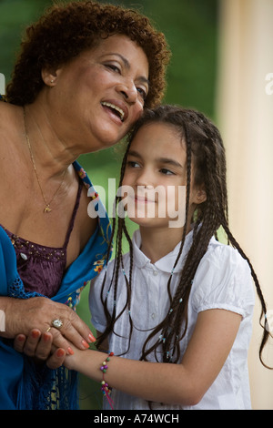 Middle-aged woman talking to her granddaughter Stock Photo