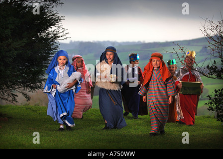 CHILDREN IN COSTUME BEFORE A PRIMARY SCHOOL NATIVITY PLAY IN A CHURCH DORSET UK Stock Photo