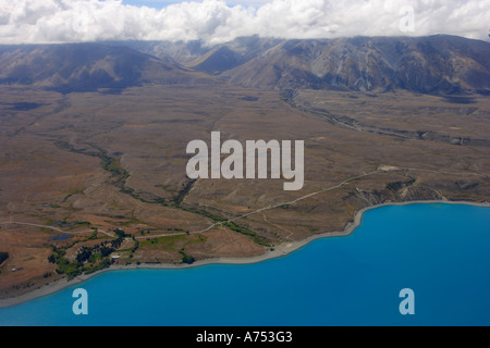 Aerial view over Lake Tekapo showing the southern alps, southern isalnd New Zealand. Stock Photo