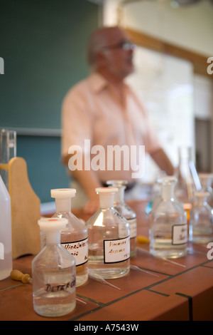 Jars of chemicals in science class Stock Photo