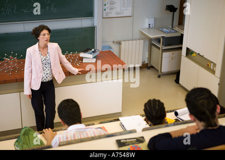 Science teacher lecturing to class Stock Photo