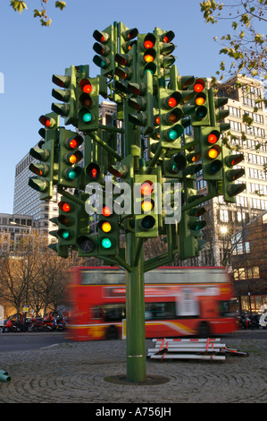 Red London bus and the Traffic Light Tree canary wharf Docklands London England UK Stock Photo