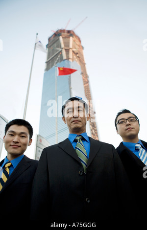 Businessmen standing in a line Stock Photo