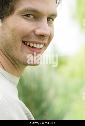 Young man smiling, portrait Stock Photo