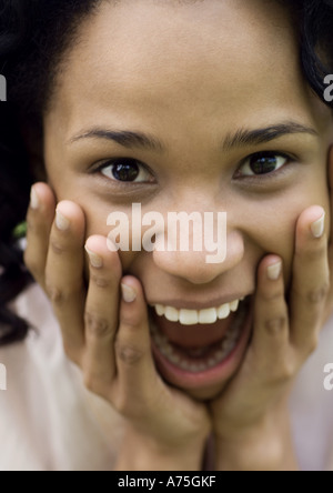 Young woman with surprised expression Stock Photo