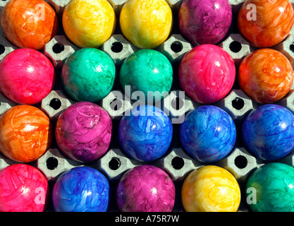 Colourful easter eggs in an egg box. Stock Photo
