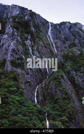 Temporary Waterfall after Rain Storm Milford Sound Fiordland National Park South Island New Zealand Stock Photo