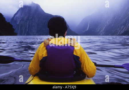 Sea Kayaking in Milford Sound Fiordland National Park South Island New Zealand Stock Photo