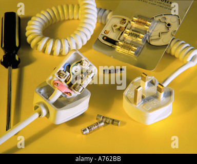 Standard 13 amp fused three pin plugs and fuses, UK Stock Photo