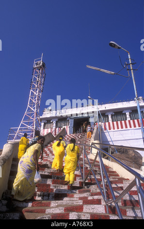 Hindu ladies on the last steps to the summit of the Rock Fort and the Tayumanasvami Temple Tiruchirapalli Tamil Nadu India Stock Photo