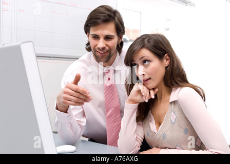 Man and woman in office, close-up Stock Photo