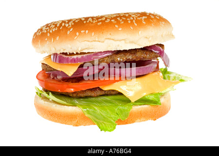 Double Beefburger with cheese and salad in a sesame seed bun on a pure white background. Stock Photo
