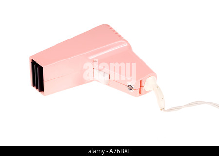 Retro pink seventies style hairdryer on a pure white background. Stock Photo