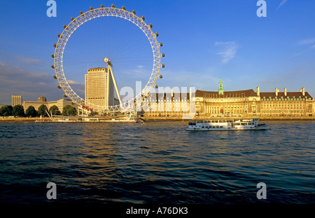 A view of the London Eye on the Southbank taken from the Northbank of the river Thames. Stock Photo