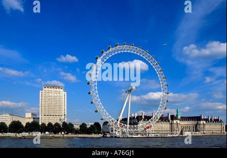 A view of the London Eye on the Southbank taken from the Northbank of the river Thames. Stock Photo