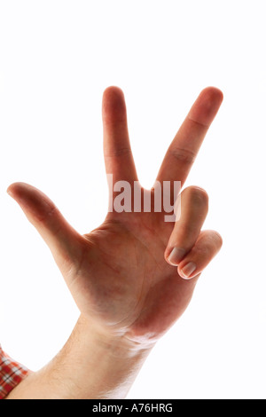 Hand showing three fingers, close-up Stock Photo