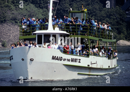 Maid of the Mist V boat carrying tourists to see Niagara Falls New York state USA Stock Photo
